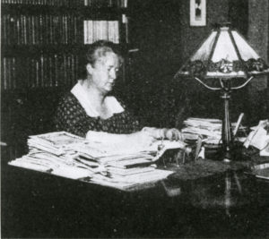 Margaret Seebach at her desk
